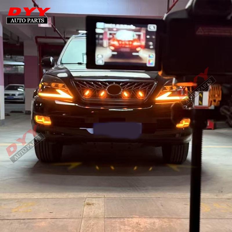 TRD Grille Kit: Compatible with 2003-2009 Lexus GX470, Featuring a Black Grille, Fog Lights, and Headlights.