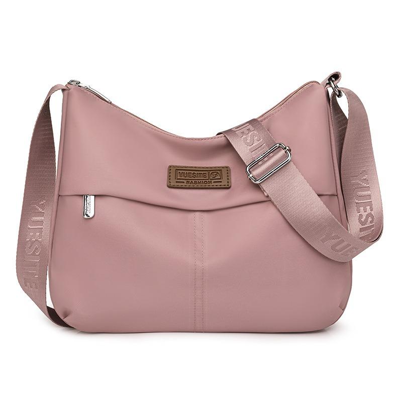 Einfacher und großzügiger Schulterrucksack Vielseitige, spritzwassergeschützte Nylontasche mit großem Fassungsvermögen Modetrend schräg getragener Damenrucksack