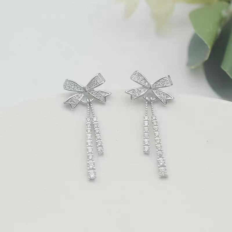 Bow Tassel Stud Earrings Female Tide Korean Temperament Niche Design Sense High-end Light Luxury Earrings