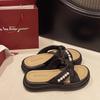 2025 new thick bottom stepping on shit feeling one-word sandals women summer wear Internet celebrity casual retro pearl national style slippers
