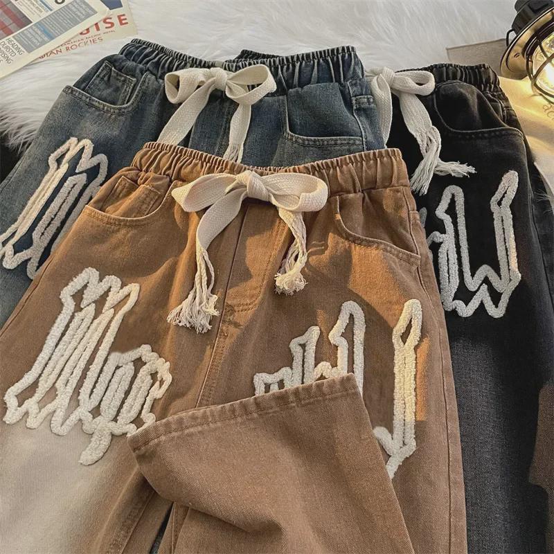 Męskie modne dżinsy proste na każdą porę roku z haftem