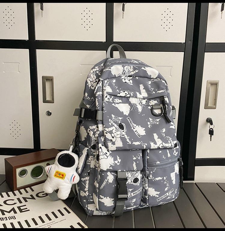 School bag large capacity multi-compartment tide cool junior high school students design sense versatile personality graffiti back