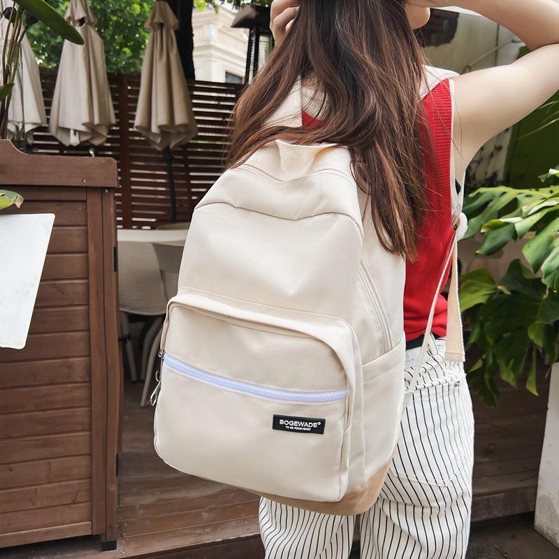 Neuer Rucksack mit großem Fassungsvermögen, schlichte und kontrastierende Farben für Mittel- und Oberschüler