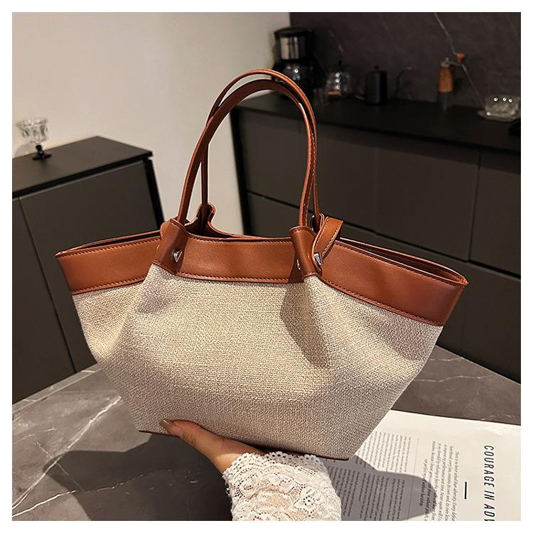 Spring New Retro Portable Shoulder Bag Niche Design Canvas Splicing Large Capacity Tote Bag