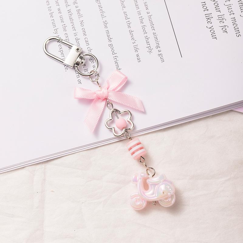 High-value pink electric donkey bow beaded mobile phone chain bag pendant ins wind keychain cute pendant female