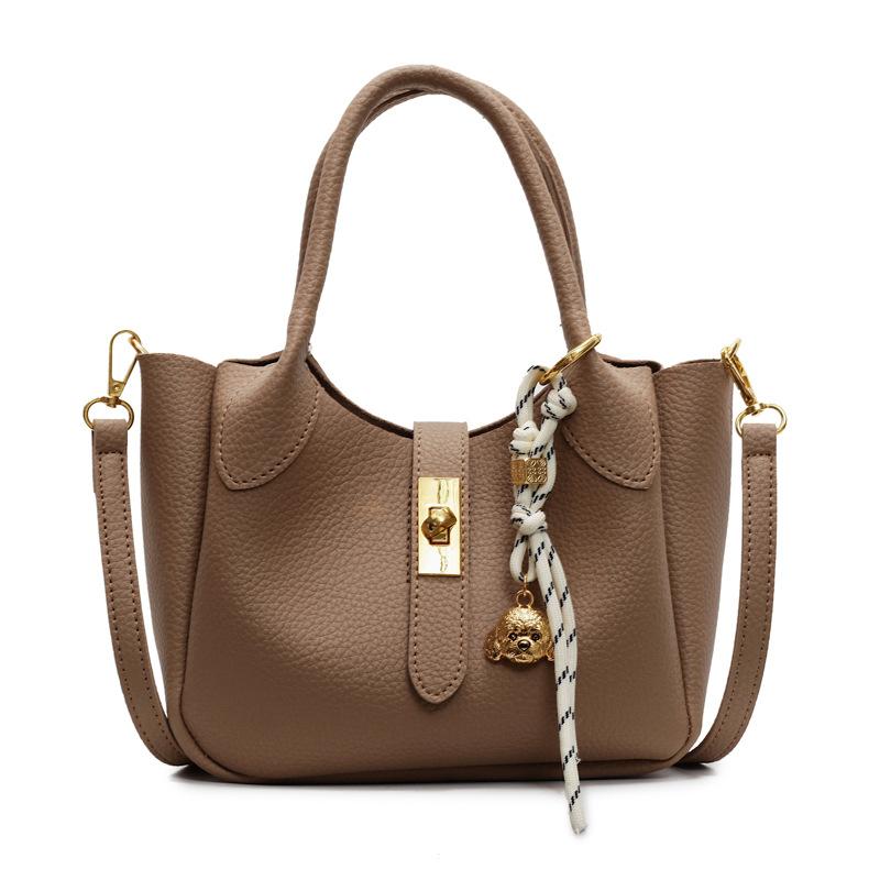 Korean version of trend temperament light luxury lychee pattern portable bucket bag women commute to work simple advanced sense messenger bag bag