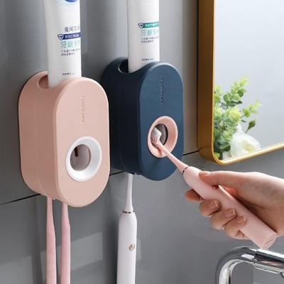 Automatisk tandkrämsdispenser Väggfäste Dammtät tandborsthållare Väggmonterad badrumstillbehörssats Squeezer