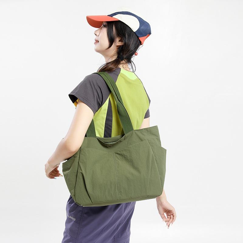 Large-capacity simple casual shoulder bag women's new versatile lightweight tote bag class commuter bag