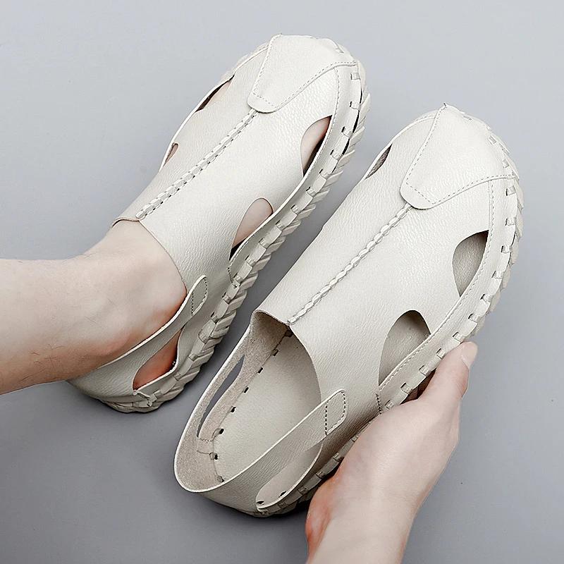 

Модные мужские летние новые сандалии, нескользящие, кожаные сандалии, для взрослых, на плоской подошве, для вождения, для прогулок, для ежедневных поездок на работу, модные тенденции, сандалии 46 белый