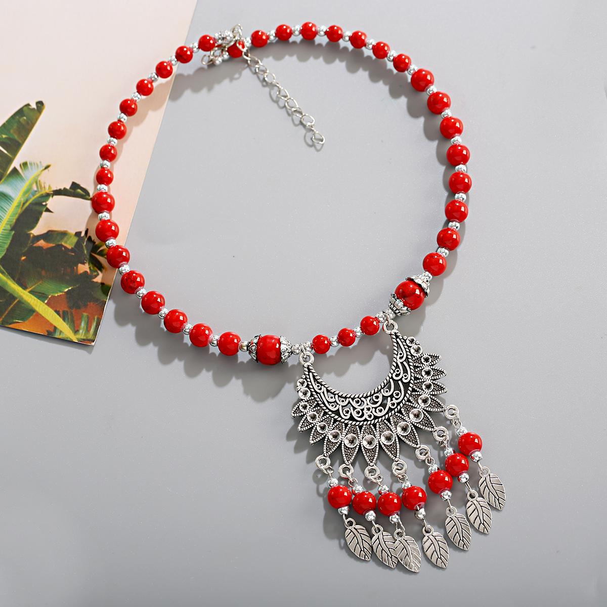 

Богемный этнический стиль Натуральный камень Бирюза Ожерелье Сплав Подвеска Металлическое перо Кисточка Ожерелье Циркон Аксессуары Женское