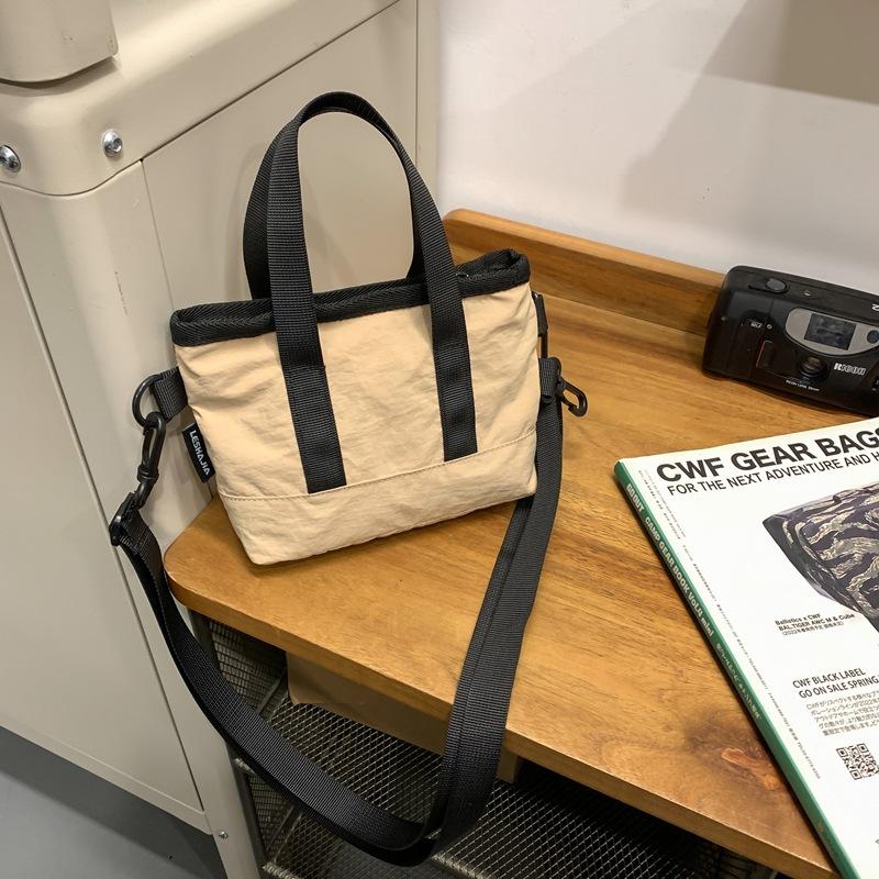 Crossbody bag women's small bag 2025 new foreign style personalized solid color portable simple shoulder bag trendy casual bucket bag