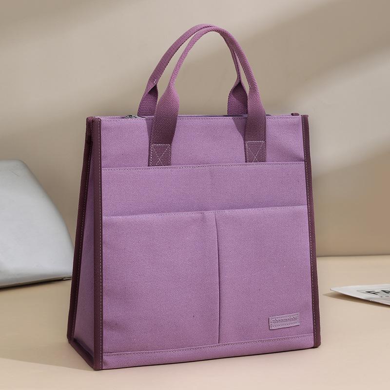 The Handbag Is Fashionable and Simple The Computer Bag Is Lightweight The Document Bag Is A Tote Bag