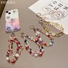 Accesorii pentru telefoane – Curele și brelocuri pentru telefoane