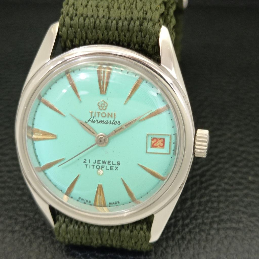 USED TITONI AIRMASTER TITOFLEX SWISS MENS TURQUOISE BLUE DIAL WATCH a432180-2 R110-a432180
