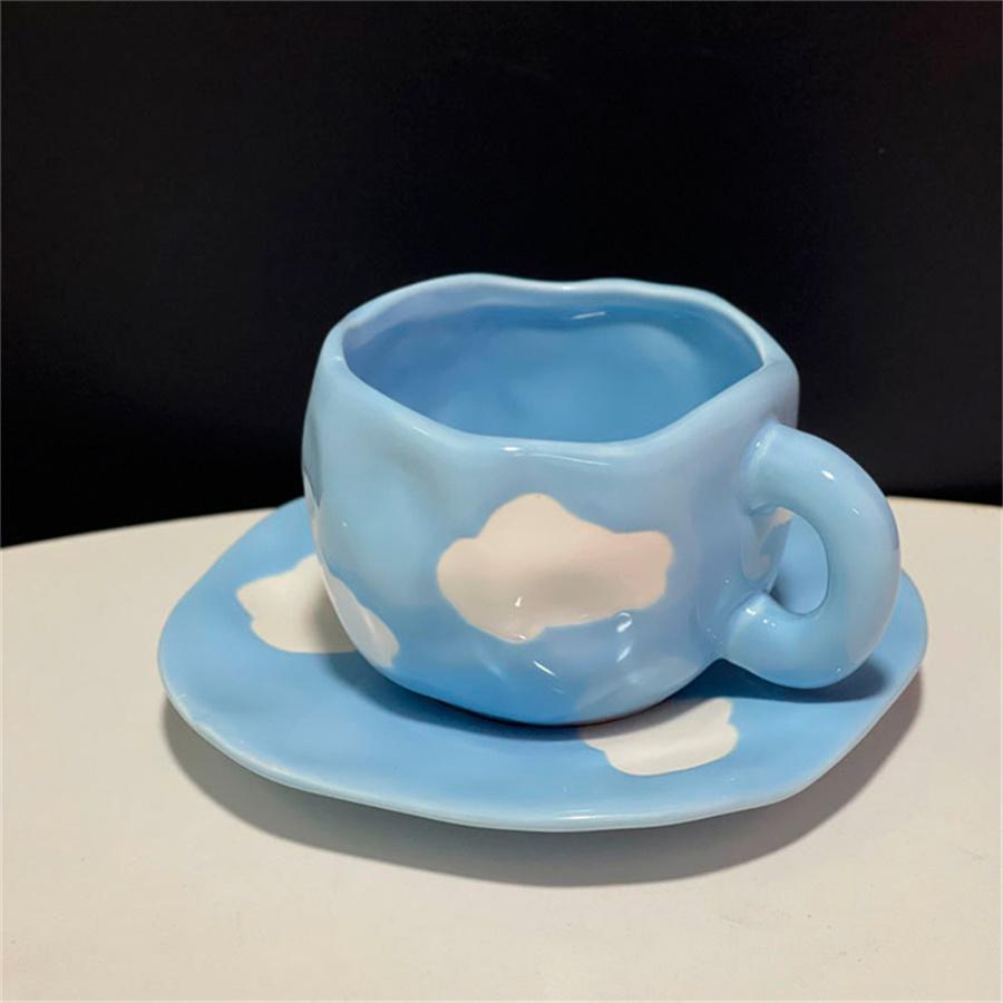 Creative small fresh underglaze color hand-painted white cloud coffee cup and saucer hand-squeezed irregular