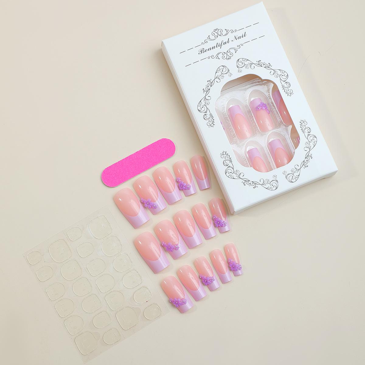 

Фиолетовые цветочные экстрадлинные накладные ногти во французском стиле