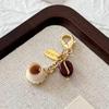 Ladies' bag pendant keychain brown earbud cover with zipper creative and cute coin wallet pendant