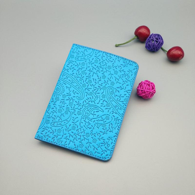 Travel Essentials PU Leather Passport Holder with Waterproof Features and Card Slots