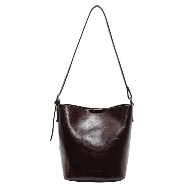 Einfache Tasche in Unifarbe Damen neue High-End-Textur Nische Pendlertasche Eimertasche Umhängetasche
