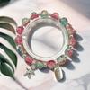 Braccialetto in Vetro Fiore Esplosione Fantasy da 10 mm: Ciondolo Farfalla Colore Degradé Design di Nicchia per Donne e Migliori Amiche.