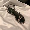 Flat-soled sandals for women to wear in the summer of 2025, new fairy wind open-toed French flash rhinestones with Roman shoes