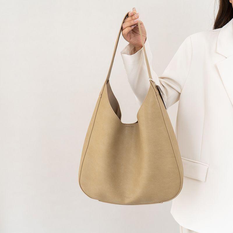 

Niche Fashion Soft Leather Tote Bag Women 2025 New Large Capacity Casual All-matching Idle Style Commuter Shoulder Bag Cold-adjusted milk tea khaki