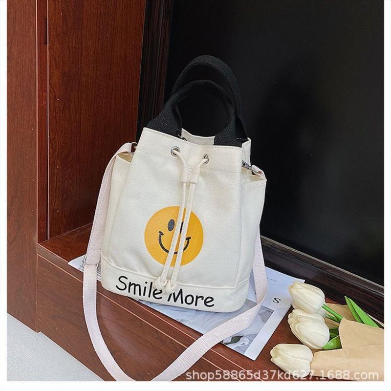 New contrasting color canvas bag 2026 new women s bag Korean fashion bucket bag messenger bag canvas bag women чёрный