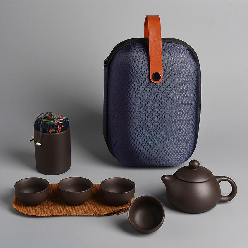 

Kuaike cup purple sand travel tea set, one pot and four cups of gifts.