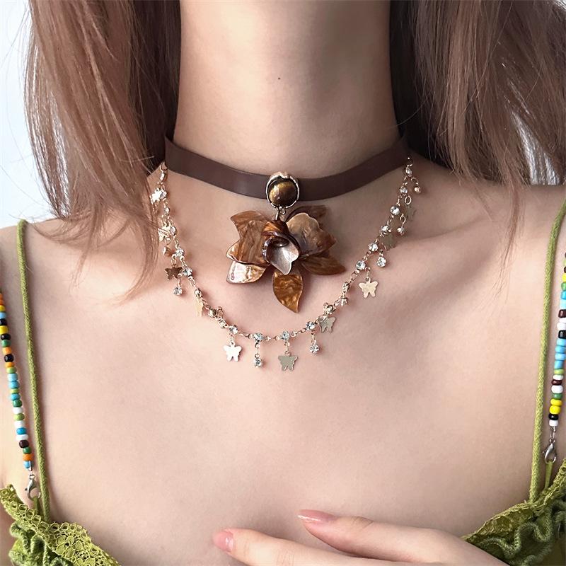 Diamond leather tiger's eye stone butterfly flower pendant necklace personalized retro light luxury neck chain niche temperament jewelry women