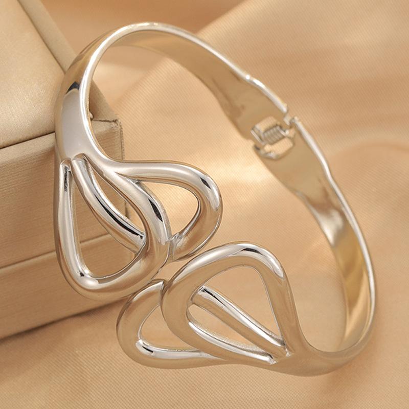 Couple Style Hollow Symmetrical Bow Elastic Open Jewelry Bracelet