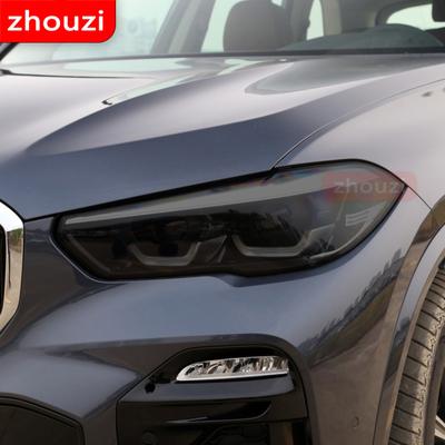 Film de Protection noir en vinyle pour phares de voiture, 2 pièces, pour BMW X5 F15 M F85 G05, autocollant Transparent en TPU, accessoires