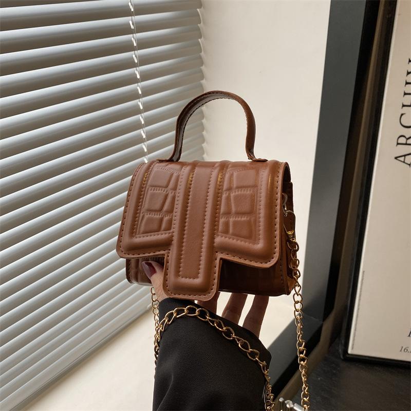 Neue Frühling- und Sommer-Mode einfarbige kleine quadratische Tasche Trend hohe Textur Mini tragbare Schulter-Umhängetasche Damen