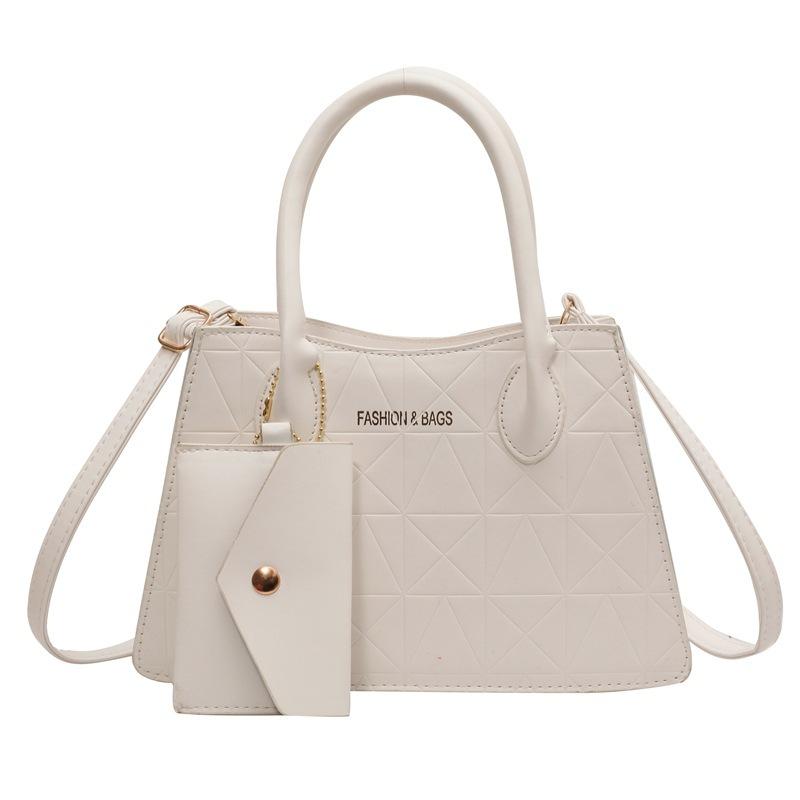 Kadın çantası 2025 yeni çocuk ve anne çantası PU kadın çantası Avrupa ve Amerikan büyük çanta çok parçalı set omuz çantası Bayan çantası