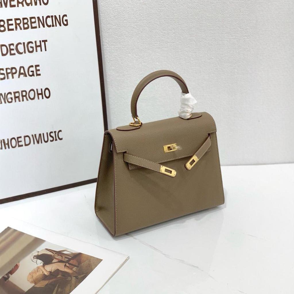 2024 nieuwe verticale tas palmdruk TOGO koeienhuid schoudertas handtas grote capaciteit dames tas leer lichte luxe leer