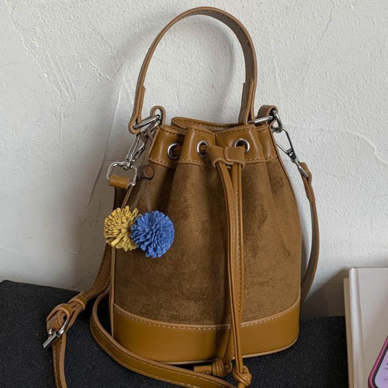 

Go out handbag women s new fashion retro shoulder bag commuter messenger bag bucket bag коричневий