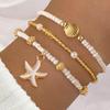 5 Stück Bohemian Meeresmotiv Perlenbesticktes mehrschichtiges Armband-Set für Damen Seestern Schildkrötenpanzer Anhänger Sommer Strandurlaub Schmucksets