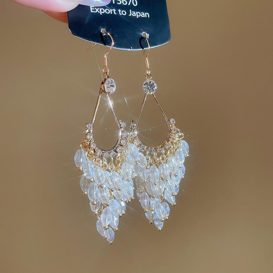 Роскошные серьги с хрустальной бахромой: Европейский и американский дизайн с сияющей элегантностью