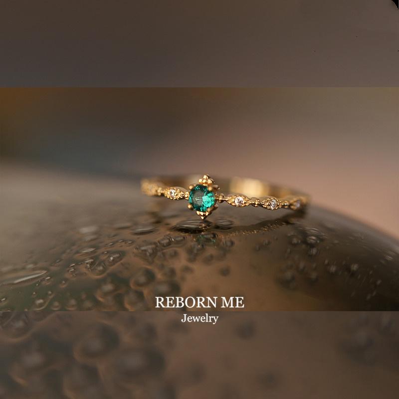 

S925 sterling silver plated 14K gold inlaid emerald ring, fashionable light luxury design style simple and beautiful ring women Port code no. 7 золотой