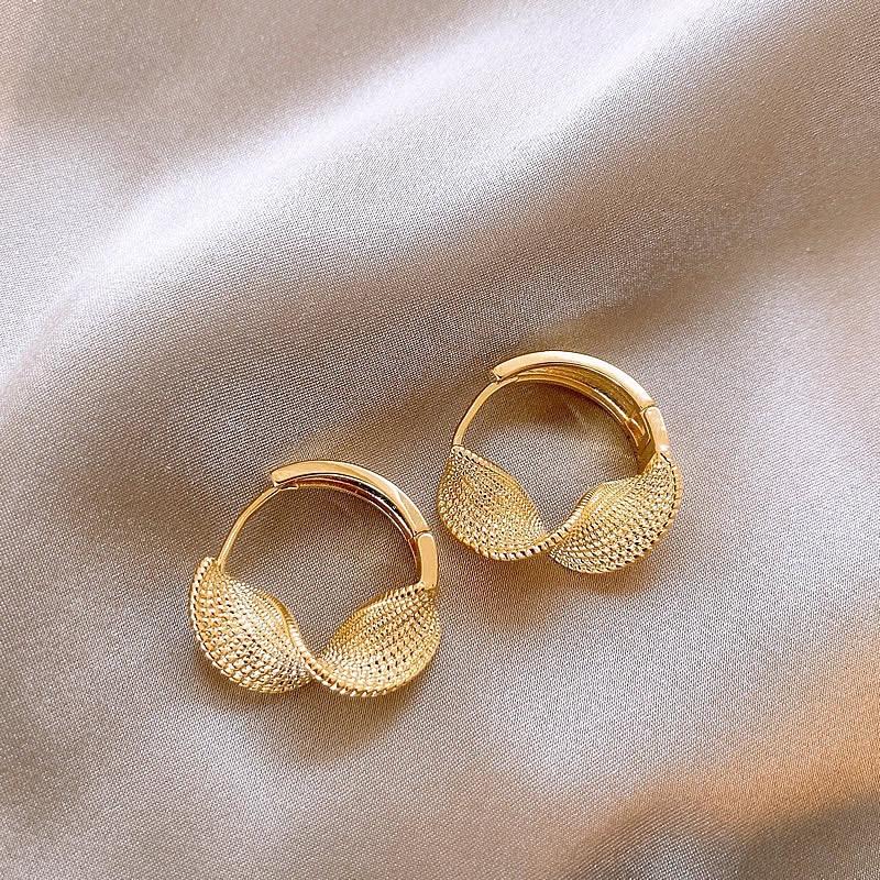 

New niche design twist texture geometric earrings women s, simple high-end earrings earrings earrings