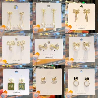 Eleganti Orecchini a Fiocco di Diamanti Ago Argento - Moda Lussuosa e di Alta Qualità per Donne