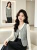New women's down cotton vest in autumn and winter, piled and thickened to keep warm, wearing short V-neck sleeveless vest