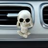 Creative car skull ornaments with the design of "see no evil, hear no evil, speak no evil", which are car interior decorations.