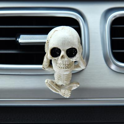 Ornamente creative pentru mașină cu cranii, în designul „nu vede răul, nu aude răul, nu vorbește răul”, care sunt decorațiuni interioare pentru mașină.
