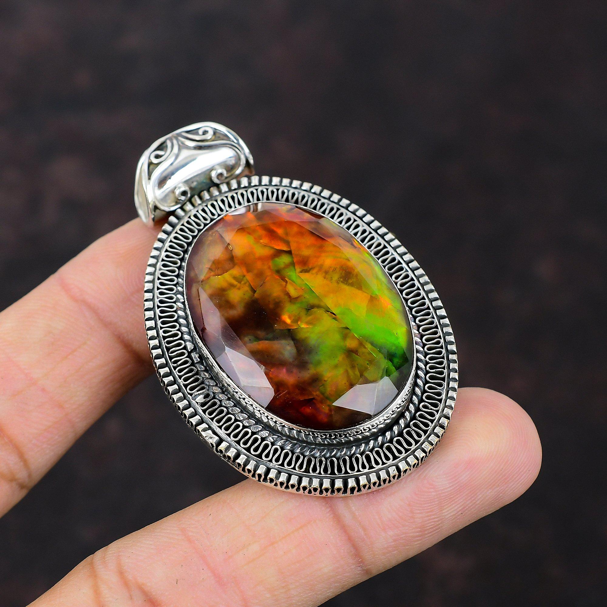 

Ограненный кулон с аммолитом. Кулон из натурального драгоценного камня. Антикварные ювелирные изделия. Кулон из стерлингового серебра 925 пробы. Кулон ручной работы. Подарок для него. Ювелирные изделия с аммолитом.