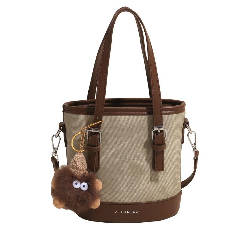 Autumn and winter niche design bags women's new trendy and popular versatile messenger bags casual commuting portable bucket bags