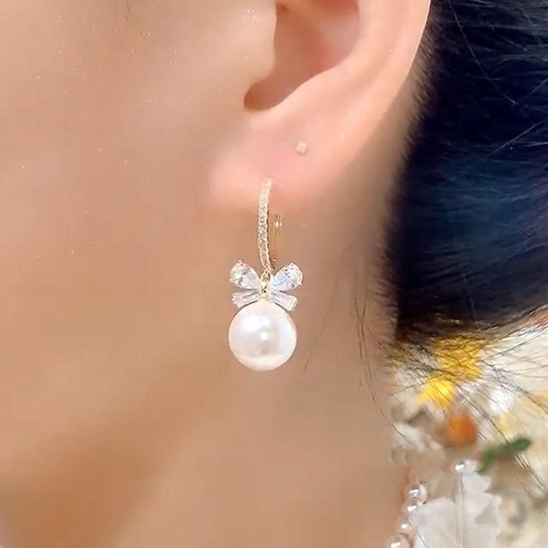 Temperament Bow Pearl Ear Buttons Light Luxury Sense of Senior Sense of Popular Earrings Temperament Hundred with The Fashionable Earrings