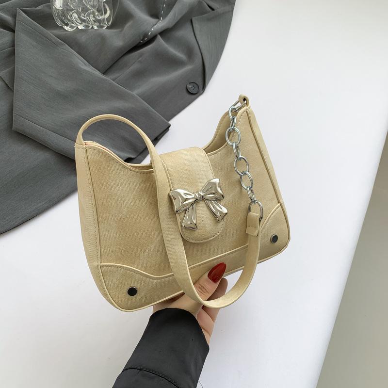 

2024 Весна нишевый дизайн простая сумка через плечо повседневная сумка-ведро для поездок на работу женская нежная сумка бежевый