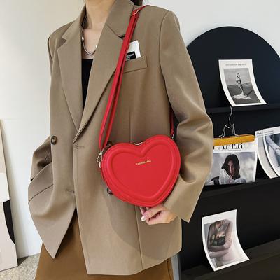 Indentation populaire polyvalent doux amour sac personnalité à la mode mignon une épaule sac à bandoulière sac à la mode