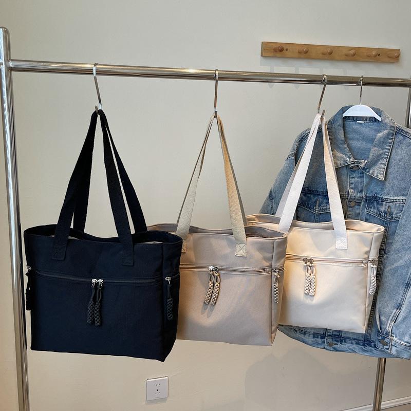 

Solid color simple large-capacity tote bag women s new literary and versatile handbag commuter college student shoulder bag one size fits all хакі