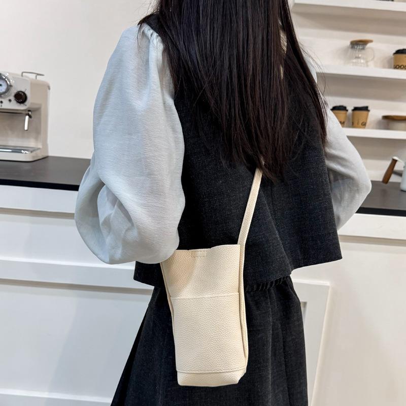 Solid color vertical mobile phone bag fashionable and simple versatile shoulder messenger bag advanced texture temperament casual women's bag